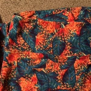 Teal, orange, red Lularoe “poinsettia” leggings
